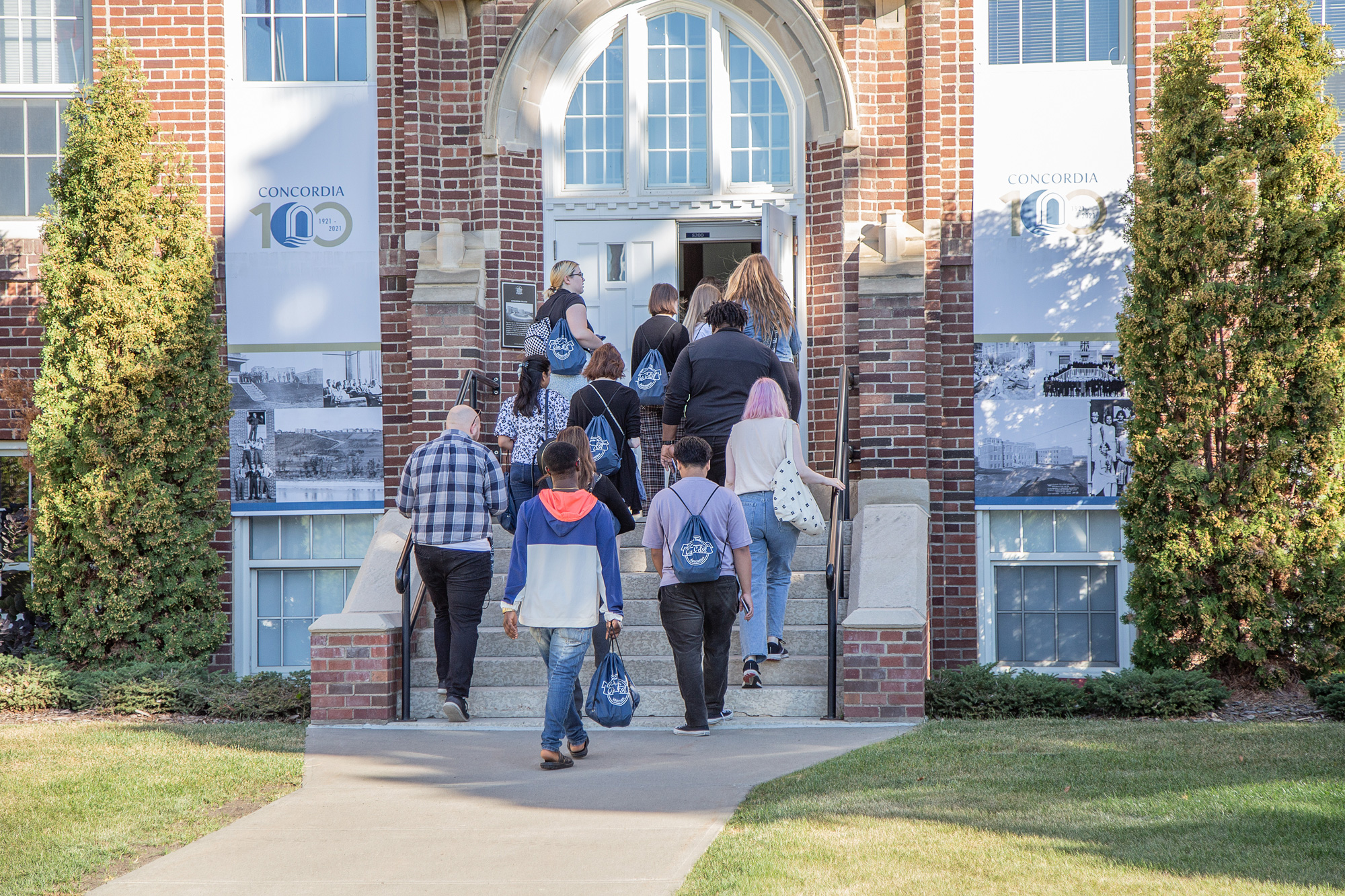 New Concordia University of Edmonton
students entering the front door of Schwemann Hall during orientation